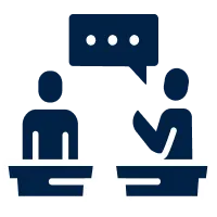 Illustration of two people sitting at desks engaged in a conversation with a speech bubble above.